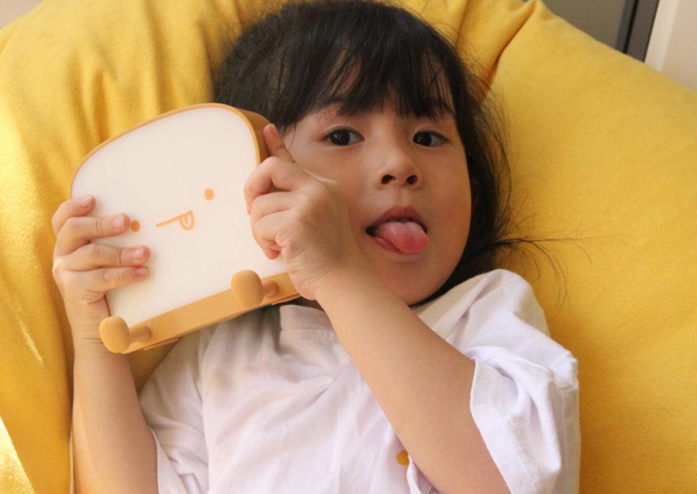 Cute Toast LED Night Light — Silicone Phone Holder Lamp with Dimmable Glow